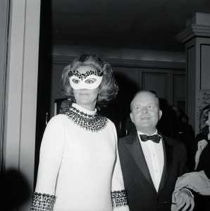 Author Truman Capote, host of a private party for 450, arrives at the Hotel Plaza holding hands with Mrs. Katherine Graham, the guest of honor. Mrs. Graham is the president of the Washington Post and Newsweek Magazine.